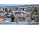 Aerial view of house with backyard and surrounding homes at 12047 W Coal Mine Dr, Littleton, CO 80127