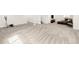 Large finished basement offering versatile space for recreation and relaxation with neutral carpet at 27986 E Frost Pl, Aurora, CO 80016