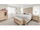 Serene main bedroom with a plush bed, soft lighting, and elegant furnishings at 27986 E Frost Pl, Aurora, CO 80016