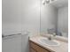 Well-maintained bathroom featuring a sink, vanity, and modern fixtures at 6450 W 44Th Pl # B-3, Wheat Ridge, CO 80033