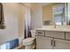 Compact bathroom features a tub with shower, a toilet, and a vanity sink at 11142 Bright Sky St, Littleton, CO 80125