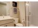Modern bathroom featuring a glass-enclosed shower, contemporary vanity, and elegant fixtures at 11142 Bright Sky St, Littleton, CO 80125