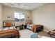 Shared bedroom with two twin beds and neutral decor, ideal for guests at 11142 Bright Sky St, Littleton, CO 80125