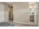 Bedroom view showcasing access to the closet and bathroom at 11142 Bright Sky St, Littleton, CO 80125