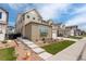 Charming two-story house with a well-maintained lawn, landscaping, and a cozy, inviting exterior at 11142 Bright Sky St, Littleton, CO 80125
