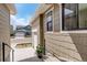 Charming exterior view showcasing the home's siding and window detail at 11142 Bright Sky St, Littleton, CO 80125