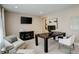 Inviting home office features a large desk, contemporary decor, and comfortable seating area at 11142 Bright Sky St, Littleton, CO 80125