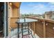 Cozy balcony with outdoor seating and string lights, perfect for relaxing at 3325 S Ammons St # 4-206, Lakewood, CO 80227