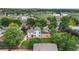 Aerial view of home with fenced yard, play set, and mature trees in a desirable neighborhood close to amenities at 7171 Canyon Way, Frederick, CO 80504