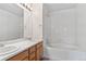 Bright bathroom with dual sinks and soaking tub at 7171 Canyon Way, Frederick, CO 80504