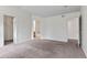 Large primary bedroom with neutral carpet and ensuite bath at 7171 Canyon Way, Frederick, CO 80504