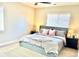 Comfortable bedroom featuring a large bed and soft lighting at 2525 S Pennsylvania St, Denver, CO 80210