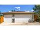 Two car garage doors on a detached garage at 2525 S Pennsylvania St, Denver, CO 80210