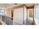 Upstairs hallway features carpet and access to multiple rooms at 2525 S Pennsylvania St, Denver, CO 80210