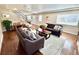 Inviting living room featuring comfortable seating and a staircase at 2525 S Pennsylvania St, Denver, CO 80210