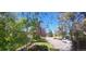 Residential street with mature trees and well maintained homes at 2525 S Pennsylvania St, Denver, CO 80210