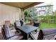 Covered outdoor patio space with outdoor furniture at 24686 E Florida Ave, Aurora, CO 80018
