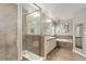 Modern bathroom featuring a glass enclosed tile shower and double sink vanity with a tub at 24686 E Florida Ave, Aurora, CO 80018
