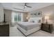 Calm bedroom with a ceiling fan and soft, neutral decor at 24686 E Florida Ave, Aurora, CO 80018