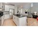 Open-concept kitchen with stainless steel appliances and granite countertops at 24686 E Florida Ave, Aurora, CO 80018