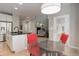 Bright kitchen with stainless steel appliances, granite countertops, and light wood flooring at 24686 E Florida Ave, Aurora, CO 80018