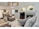 Comfortable living room features a fireplace and open floor plan at 24686 E Florida Ave, Aurora, CO 80018