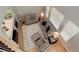 Open living room boasts ample natural light, neutral decor, and hardwood floors creating an inviting atmosphere at 24686 E Florida Ave, Aurora, CO 80018