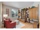 Comfortable living room with hardwood floors, built-in bookshelves, and stylish furniture at 24686 E Florida Ave, Aurora, CO 80018