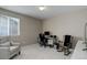 A home office featuring a desk, chair, and plenty of natural light at 24686 E Florida Ave, Aurora, CO 80018