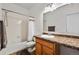 Functional bathroom with shower/tub combination and vanity at 6390 S Xanadu St, Englewood, CO 80111