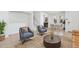 Bright living room featuring modern furnishings and a stylish decor at 6390 S Xanadu St, Englewood, CO 80111