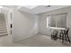Basement room with carpeting, window, and a closet near the staircase at 11615 E Maplewood Ave, Englewood, CO 80111