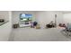 Basement recreational area with play space for , and carpeted floor at 11615 E Maplewood Ave, Englewood, CO 80111