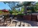 Brick patio with seating area and umbrella at 56 Hillside Dr, Wheat Ridge, CO 80215