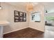 Cozy dining area with stylish decor, modern light fixture, and hardwood floors at 1539 Bennet Mountain Rd, Castle Rock, CO 80109