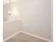 Cozy upstairs hallway with plush carpet and a modern light fixture at 1539 Bennet Mountain Rd, Castle Rock, CO 80109