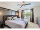 Spacious main bedroom with large windows, a ceiling fan, and neutral décor at 1539 Bennet Mountain Rd, Castle Rock, CO 80109