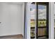 Sliding glass doors open to balcony with views of the neighborhood, sports fields and walking paths at 2108 Alcott Way, Broomfield, CO 80023