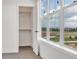 Bedroom with large windows offering great views of the neighboring outdoor athletic fields at 2108 Alcott Way, Broomfield, CO 80023