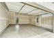 Spacious two-car garage with concrete floor and light walls, providing ample parking and storage at 2108 Alcott Way, Broomfield, CO 80023