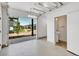 Open garage door allows a view to the outdoor space, plus a half bath at 2108 Alcott Way, Broomfield, CO 80023