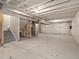 Unfinished basement with high ceilings and ample storage potential at 8115 Mt Harvard Rd, Littleton, CO 80125