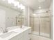 Modern bathroom with double vanity and glass shower at 8115 Mt Harvard Rd, Littleton, CO 80125