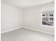 Simple bedroom with carpeted floor and window at 8115 Mt Harvard Rd, Littleton, CO 80125