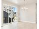 Dining area with sliding glass doors leading to a deck at 8115 Mt Harvard Rd, Littleton, CO 80125