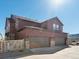 Three-car garage with stone and siding accents at 8115 Mt Harvard Rd, Littleton, CO 80125