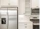 Stainless steel refrigerator with water dispenser in modern kitchen at 8115 Mt Harvard Rd, Littleton, CO 80125