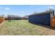Expansive backyard with detached garage and well-maintained lawn at 3011 Oneida St, Denver, CO 80207