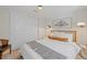Comfortable bedroom with white linens and decorative pillows at 3011 Oneida St, Denver, CO 80207