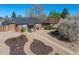 Aerial view of brick homes with low maintenance landscaping and mature shade trees at 3011 Oneida St, Denver, CO 80207